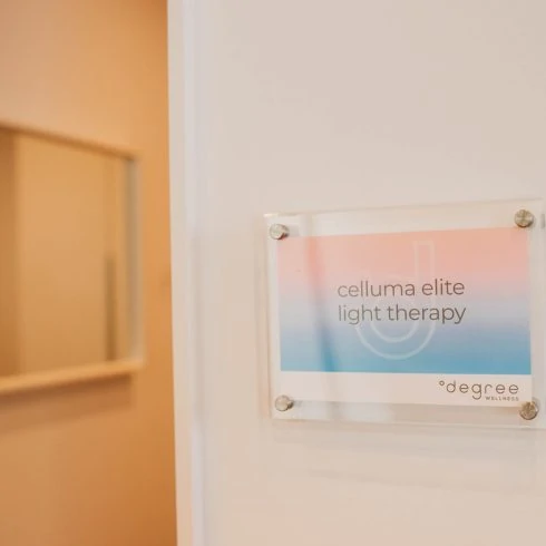 Celluma Elite Light Therapy wall sign in office.