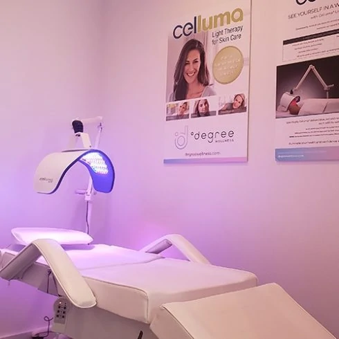 Patient bed with Celluma Elite Light Therapy equipment turned on.
